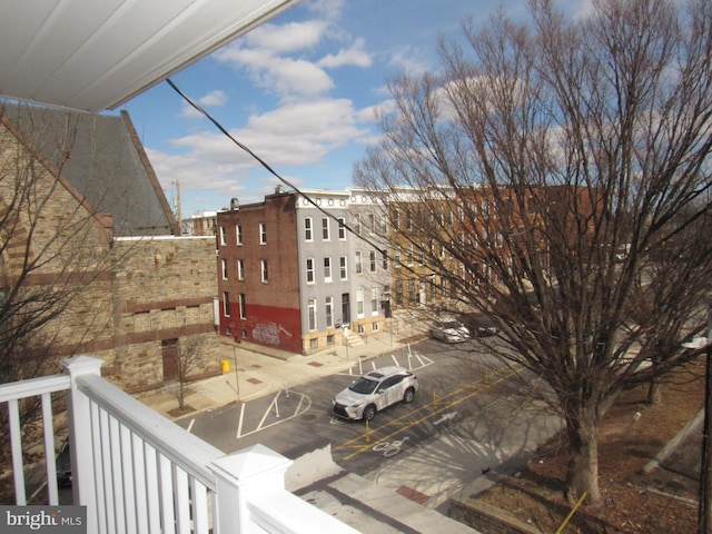 view of property featuring uncovered parking