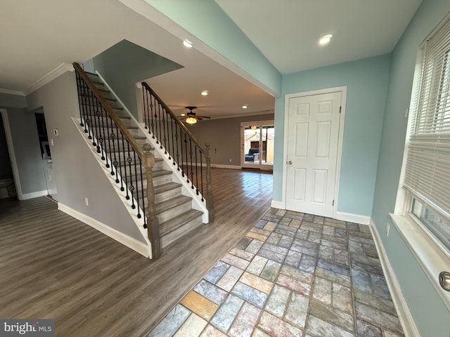 foyer featuring recessed lighting, stairway, baseboards, and wood finished floors