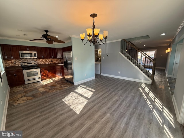 kitchen with stainless steel appliances, dark wood finished floors, ornamental molding, and decorative backsplash