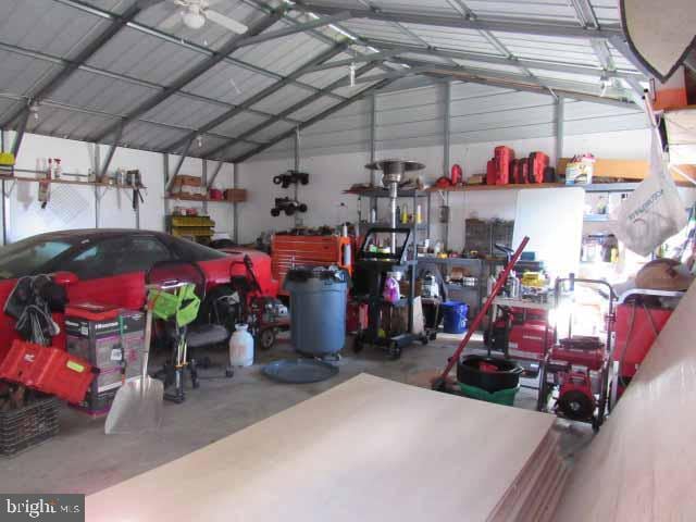 garage featuring metal wall