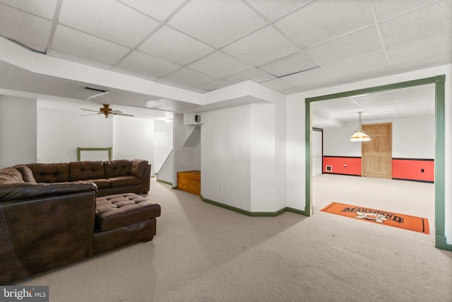 living room with baseboards, a paneled ceiling, visible vents, and carpet flooring