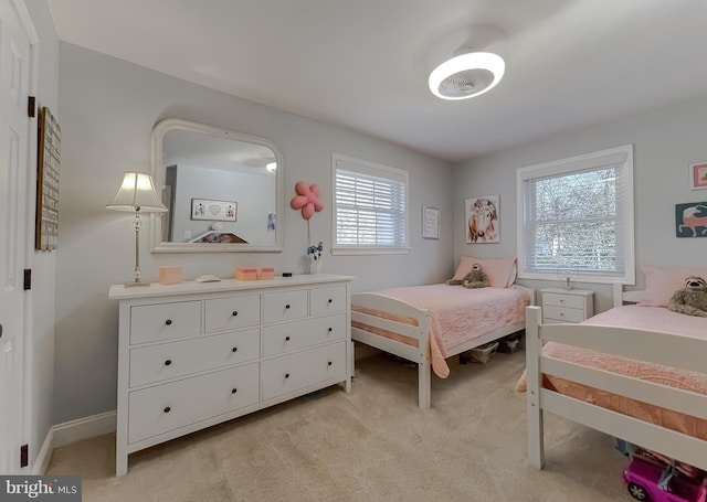 bedroom with light carpet