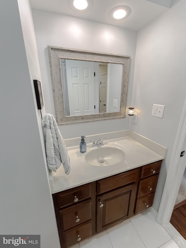 bathroom featuring tile patterned floors and vanity