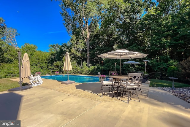 outdoor pool with a patio