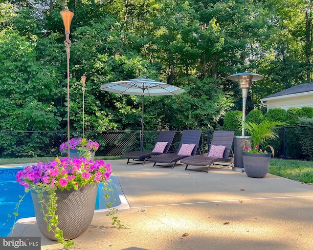 view of patio with fence