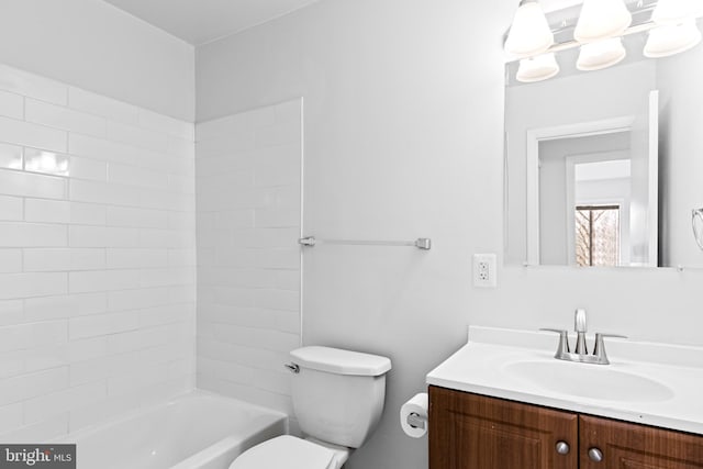 full bathroom featuring shower / bathtub combination, vanity, and toilet