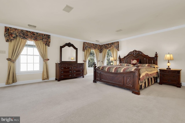 carpeted bedroom with baseboards, multiple windows, and ornamental molding