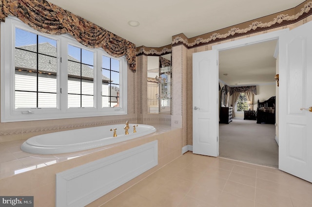 full bathroom with a bath and tile patterned floors