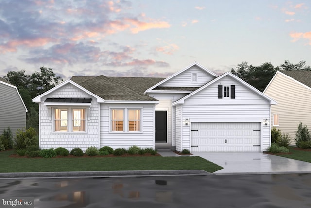 view of front of house featuring concrete driveway, roof with shingles, and a lawn