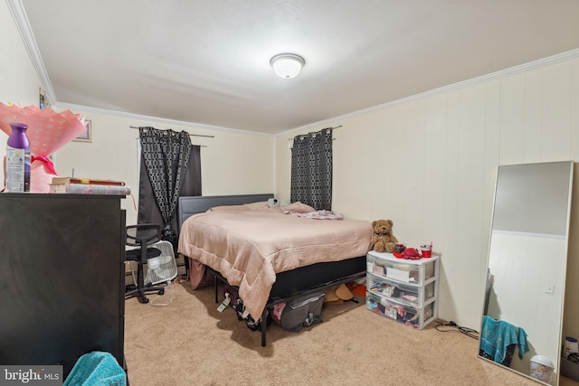 carpeted bedroom with ornamental molding