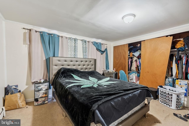 carpeted bedroom featuring baseboards and baseboard heating