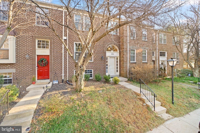 multi unit property featuring brick siding