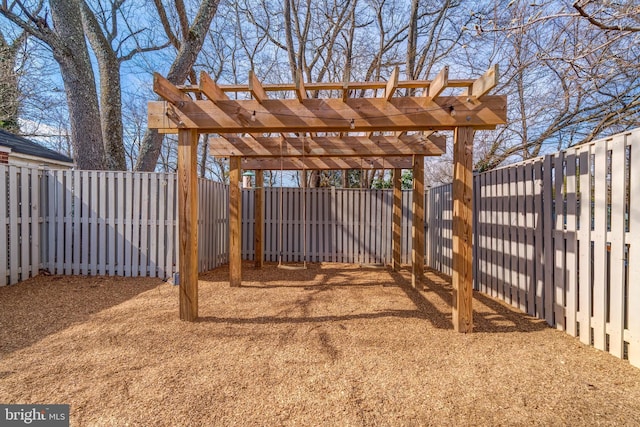 view of yard featuring a fenced backyard and a pergola