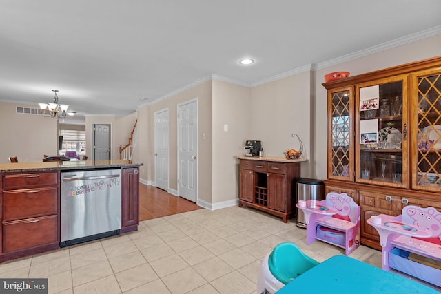 kitchen featuring visible vents, crown molding, stainless steel dishwasher, and light tile patterned flooring