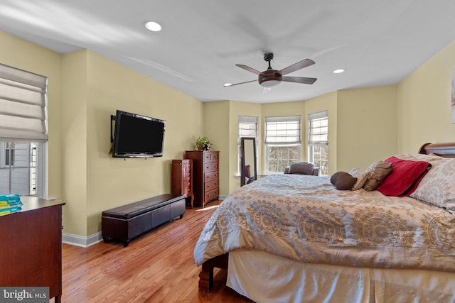 bedroom with ceiling fan, baseboards, wood finished floors, and recessed lighting