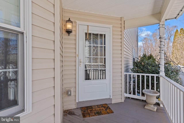 entrance to property with covered porch