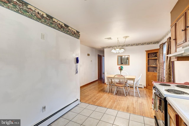 dining space featuring light tile patterned flooring, a notable chandelier, visible vents, and a baseboard radiator