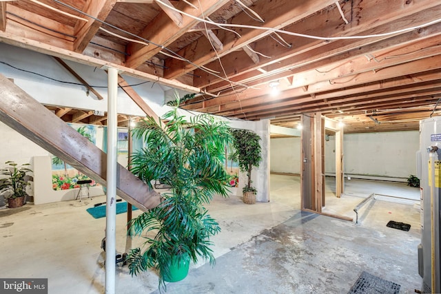 unfinished basement with gas water heater