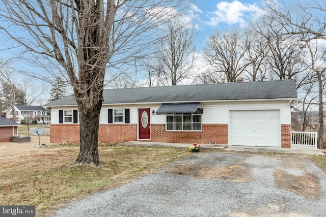 ranch-style home featuring an attached garage, brick siding, driveway, and a shingled roof