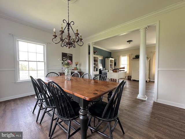 dining area with dark wood-style floors, decorative columns, ornamental molding, and baseboards