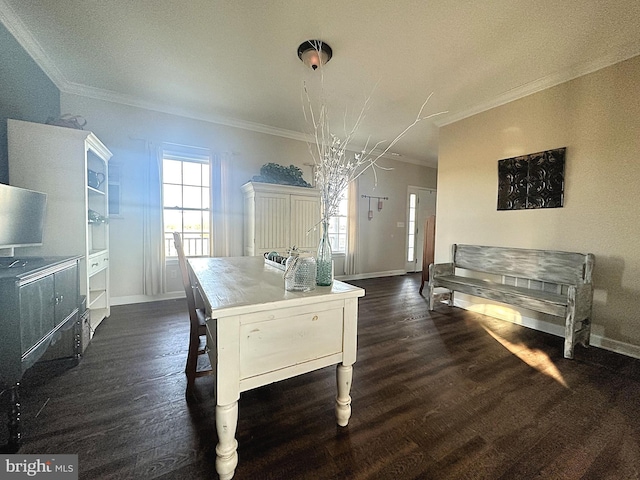 dining area featuring dark wood-style floors, baseboards, and crown molding