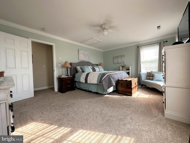 bedroom with attic access, baseboards, ceiling fan, ornamental molding, and carpet flooring