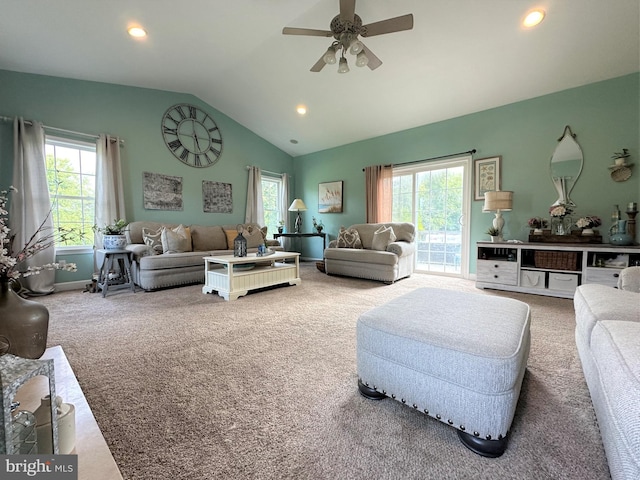 carpeted living room featuring lofted ceiling, ceiling fan, baseboards, and recessed lighting