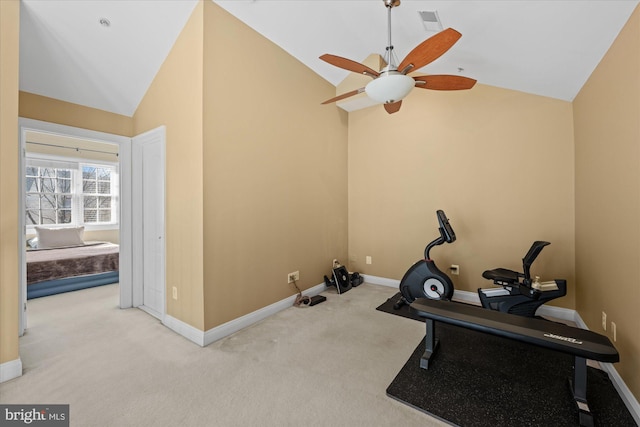 workout room with visible vents, baseboards, lofted ceiling, carpet floors, and a ceiling fan