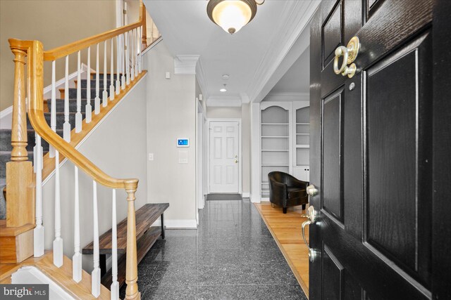 foyer entrance with baseboards, granite finish floor, recessed lighting, stairs, and crown molding