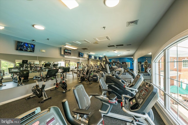 workout area featuring visible vents and attic access