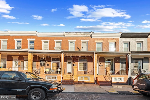 view of front facade featuring brick siding