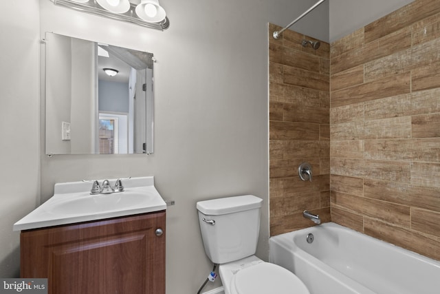 full bath with toilet, vanity, and shower / bathing tub combination