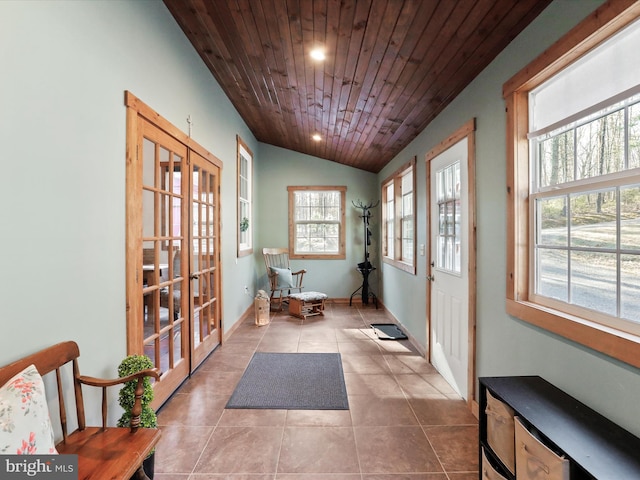 doorway with wooden ceiling, recessed lighting, vaulted ceiling, french doors, and tile patterned floors