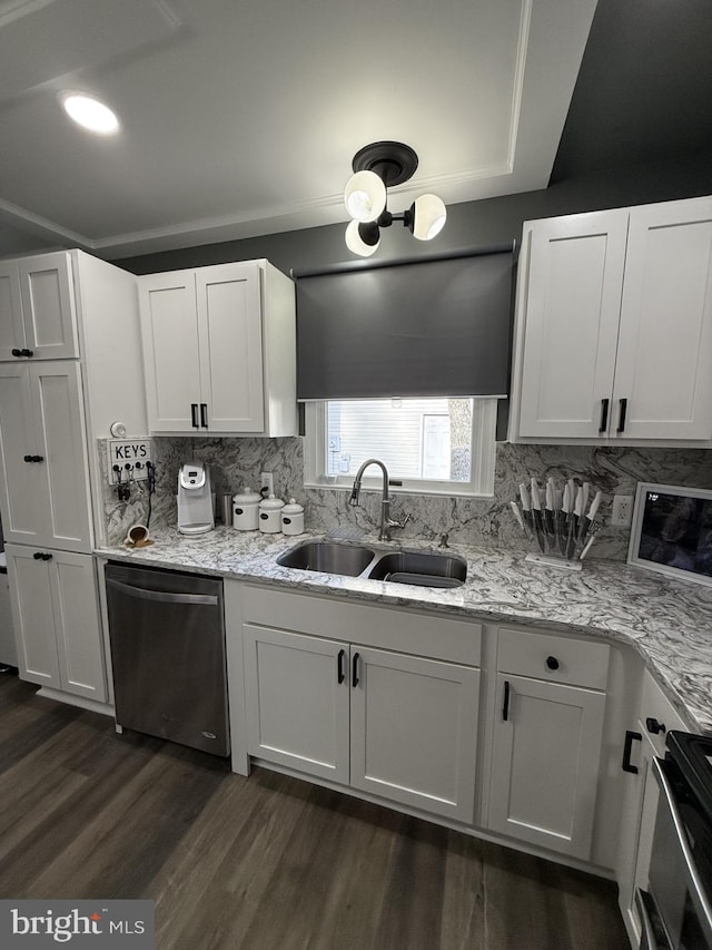 kitchen with decorative backsplash, dishwasher, dark wood-style floors, white cabinetry, and a sink