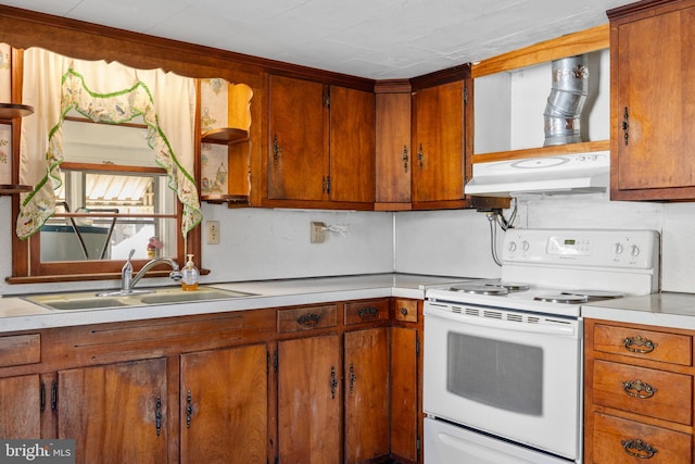 kitchen with white electric range oven, light countertops, under cabinet range hood, open shelves, and a sink