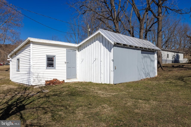 exterior space with an outbuilding