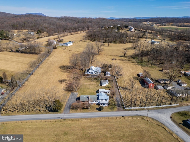 birds eye view of property featuring a rural view and a mountain view