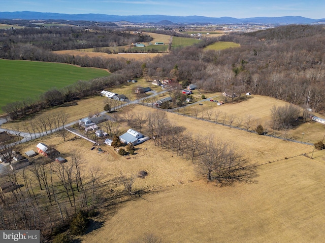 aerial view featuring a rural view and a mountain view