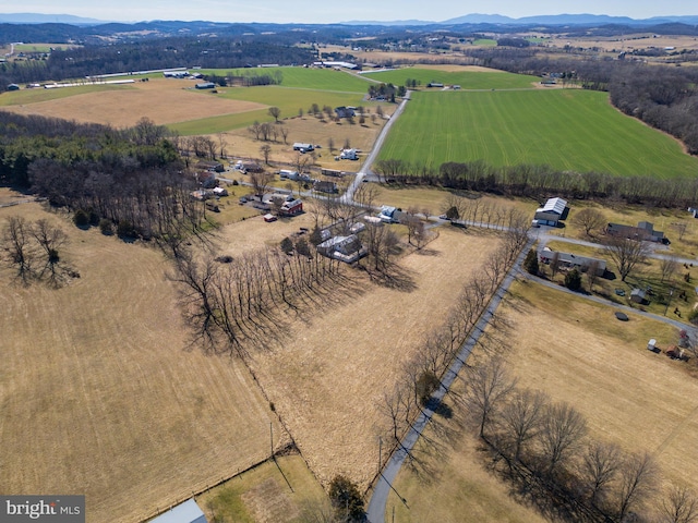 bird's eye view featuring a rural view and a mountain view