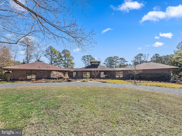 view of front of home with a front yard