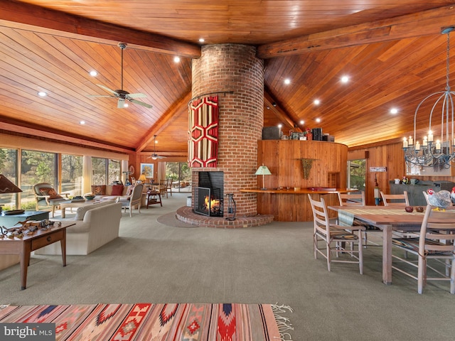 living room featuring a brick fireplace, beamed ceiling, carpet flooring, wooden ceiling, and high vaulted ceiling