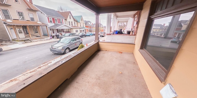 balcony featuring a residential view