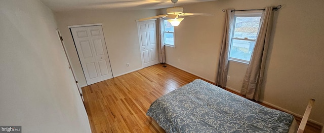 bedroom with wood finished floors