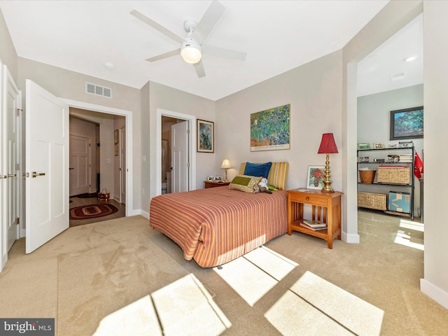 bedroom with visible vents, baseboards, and carpet