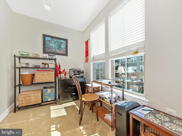 home office featuring a healthy amount of sunlight, carpet, and baseboards