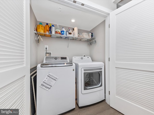 laundry room featuring laundry area and washing machine and dryer