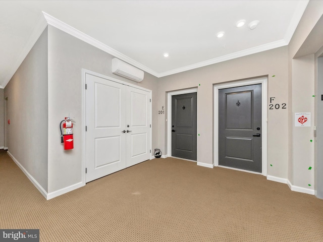 entrance foyer featuring baseboards, light carpet, an AC wall unit, and crown molding