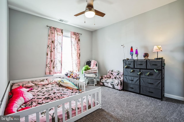 bedroom with a ceiling fan, carpet, visible vents, and baseboards