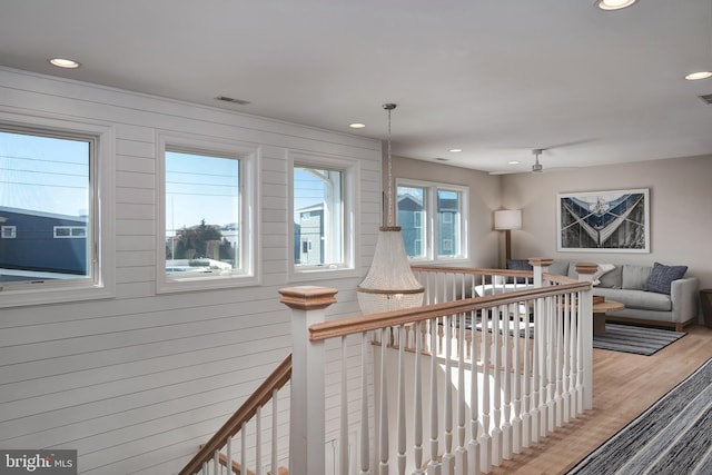 interior space featuring visible vents, wood finished floors, and recessed lighting