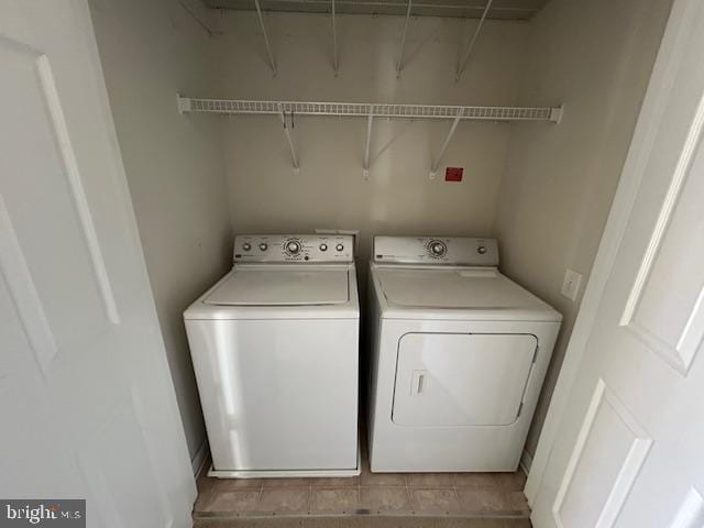 clothes washing area with laundry area and washing machine and dryer